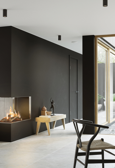 VISIO 90 RD GAS Gas-Kamin VISIO 90 RD passt als Raumteiler in einer schwarzen Wand ideal zwischen Wohnzimmer und Esszimmer und strukturiert den schlicht dekorierten Wohnraum