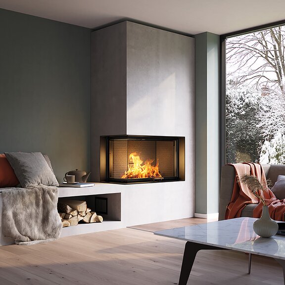 Holz-Kamineinsatz VISIO 2 L mit einer gemütlichen Seitenbank im Wohnzimmer bei Winterstimmung
