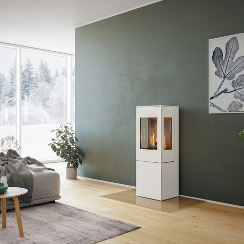 NEXO 120 GAS in Weiss mit Stahltür Gas-Kaminofen NEXO 120 in Weiss mit Stahltür und zwei Seitenfenstern vor grüner Wand in dekorativem Wohnraum