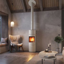 VIVA 140 L in der Farbe Sand mit Stahltür Holz-Kaminofen VIVA 140 L in der Farbe Sand mit Stahltür in einer modernen Wohnung in Erdtönen