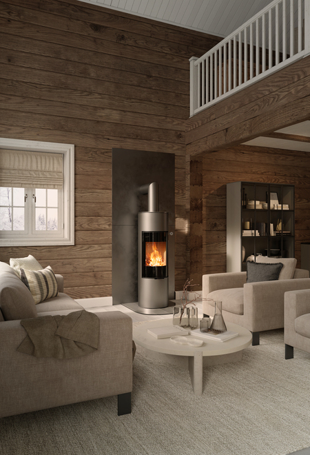 VIVA 140 L in der Farbe Platin mit Vollglas-Feuerraumtüre an Holzwand Holz-Kaminofen VIVA 140 L in der Farbe Platin mit Vollglas-Feuerraumtüre an Holzwand im rustikalen Wohnhaus
